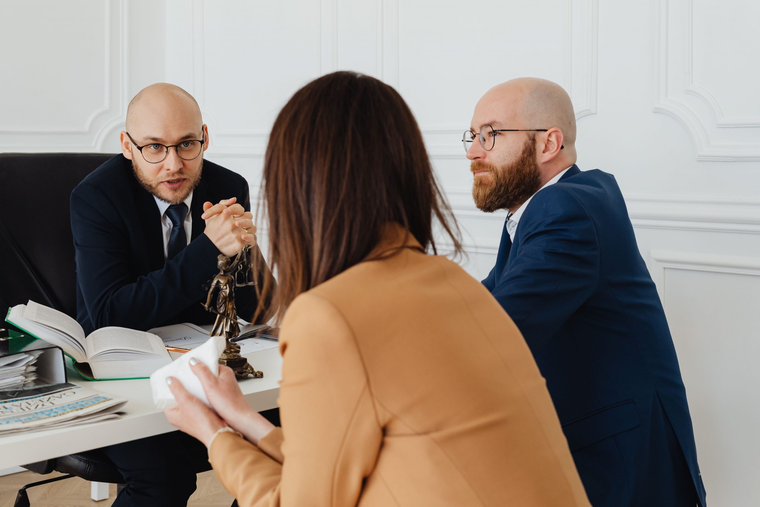 divorce lawyer speaking to clients